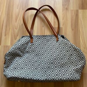 Cloth tote travel bag with faux leather handles